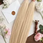 Tincsezett enyhén hamvas platina szőke 80cm 100% eredeti emberi haj/ 10gr